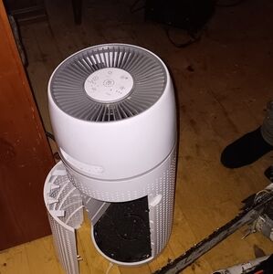 White Air Purifier with Open Filter Compartment